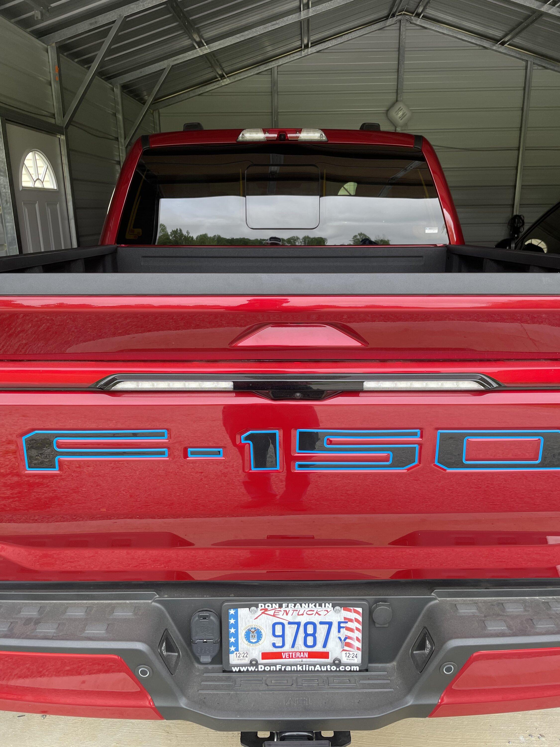Ford F-150 Lightning Raised reflective letters installed on tailgate and charge door IMG_1653