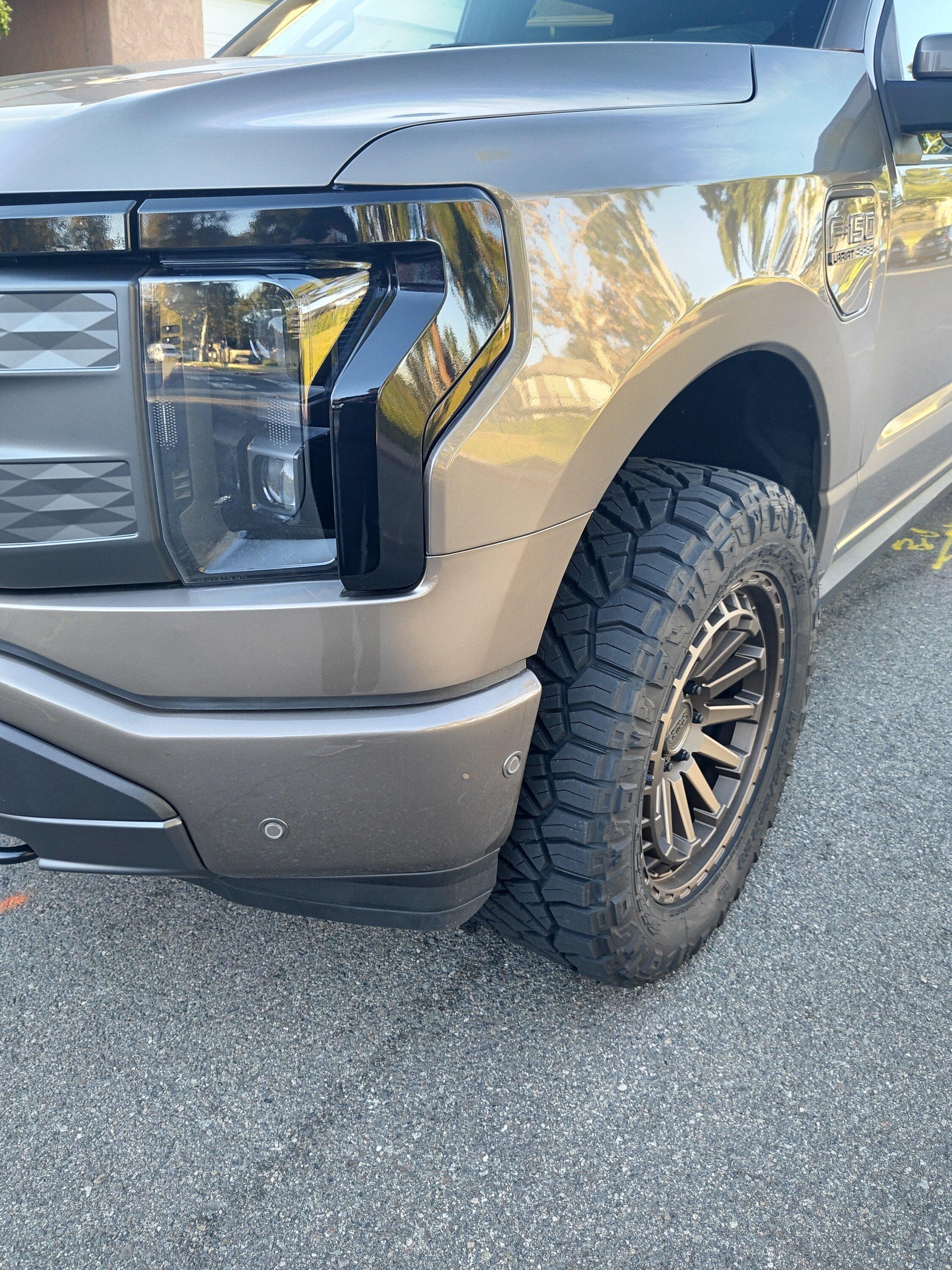 Ford F-150 Lightning Stone Gray Lightning leveled on 20" Black Rhino wheels, blacked out LED light bar, cross bars, bike rack IMG_20221114_155127