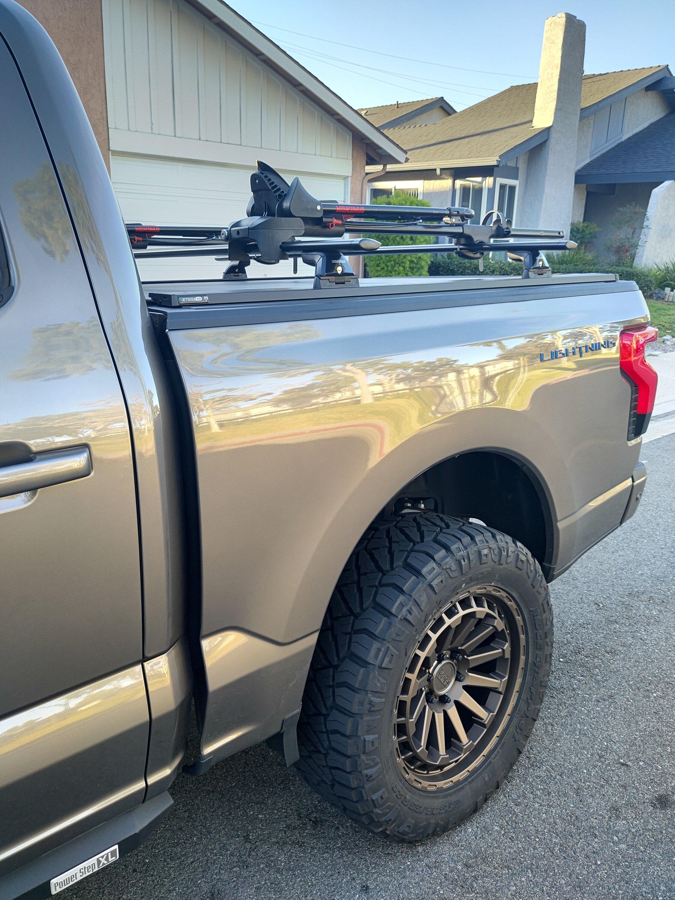 Ford F-150 Lightning Stone Gray Lightning leveled on 20" Black Rhino wheels, blacked out LED light bar, cross bars, bike rack IMG_20221114_155140