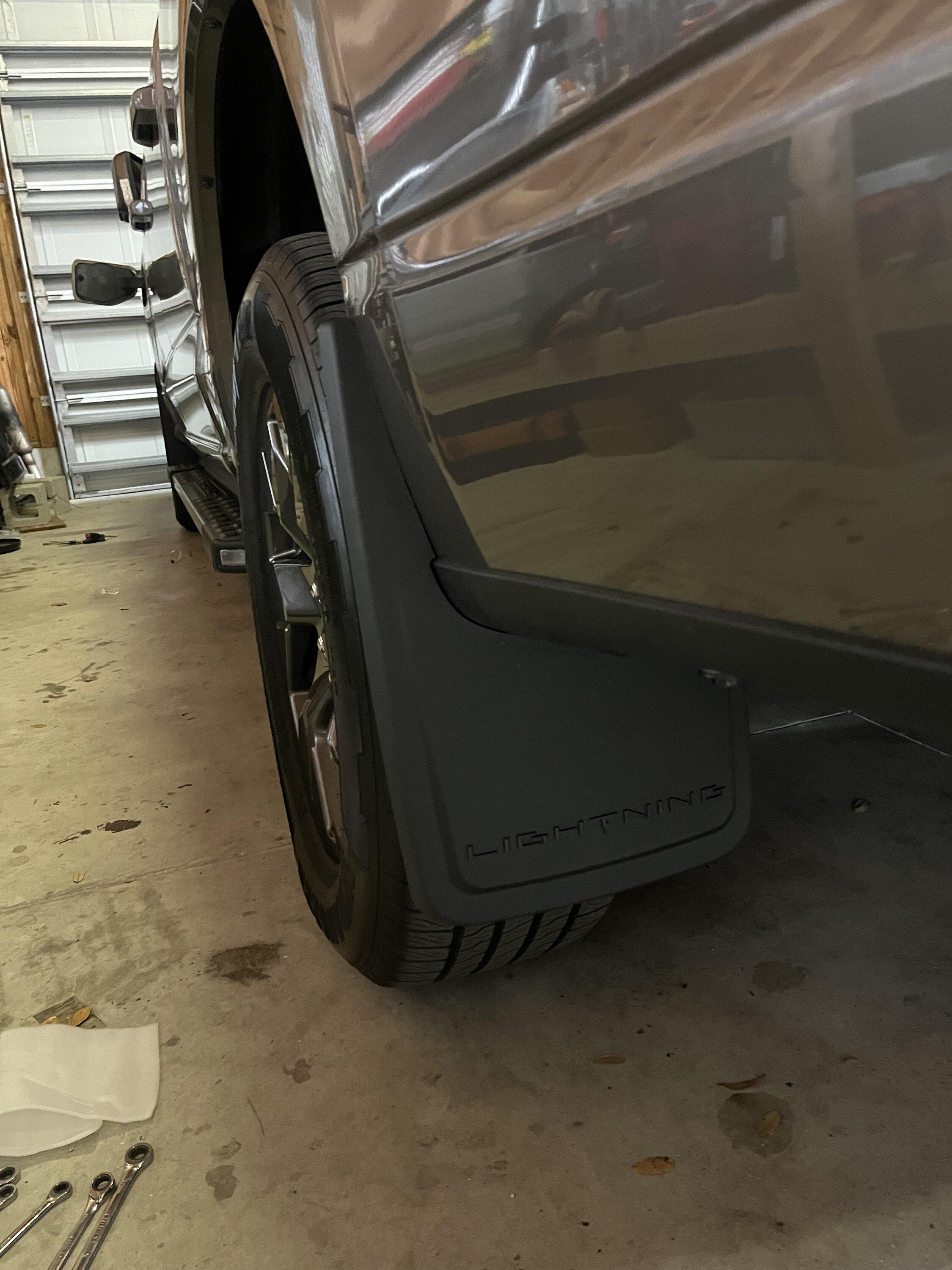 Ford F-150 Lightning OEM Mudflap Design update (maybe?). No more drilling required IMG_3040