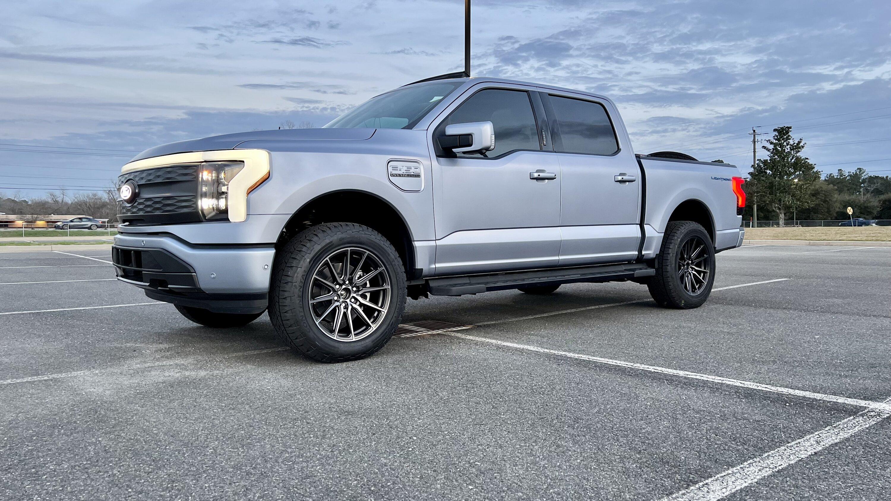 Ford F-150 Lightning Iced Blue Silver Lightning Build. Mods: PPF matte finish, Line-X, gloss black painted grille, black wrapped roof, wheels IMG_4127