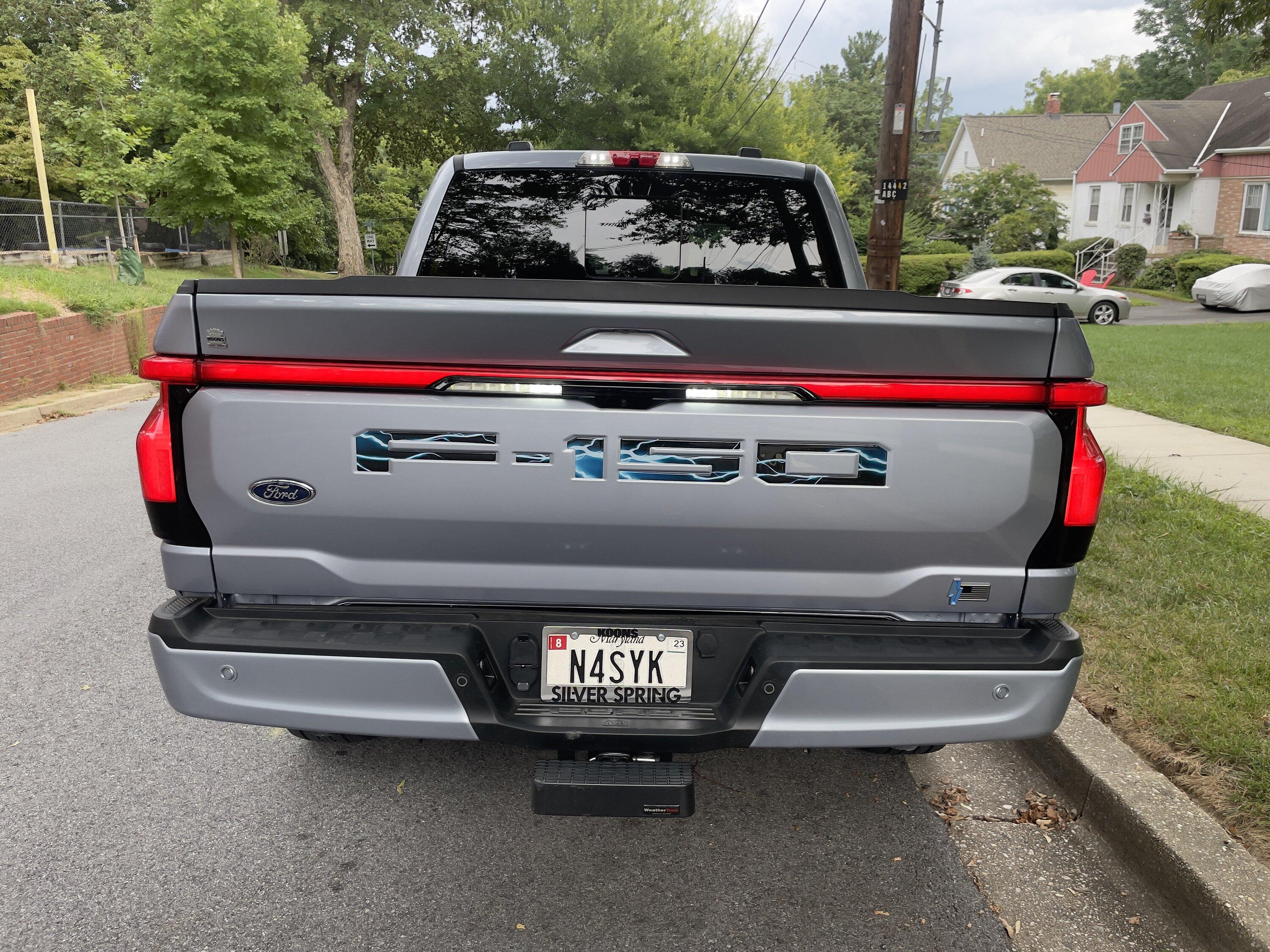 Ford F-150 Lightning Raised reflective letters installed on tailgate and charge door IMG_4835