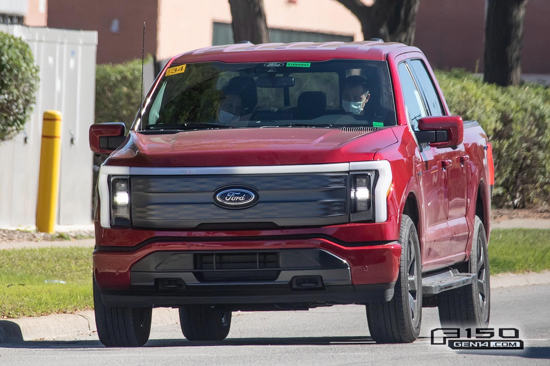 Ford F-150 Lightning F-150 Lightning Platinum (Iconic Silver) & Lariat (Rapid Red) Spotted On Public Roads Production Rapid Red 2022 F150 Lightning Lariat EV Pickup Truck 1