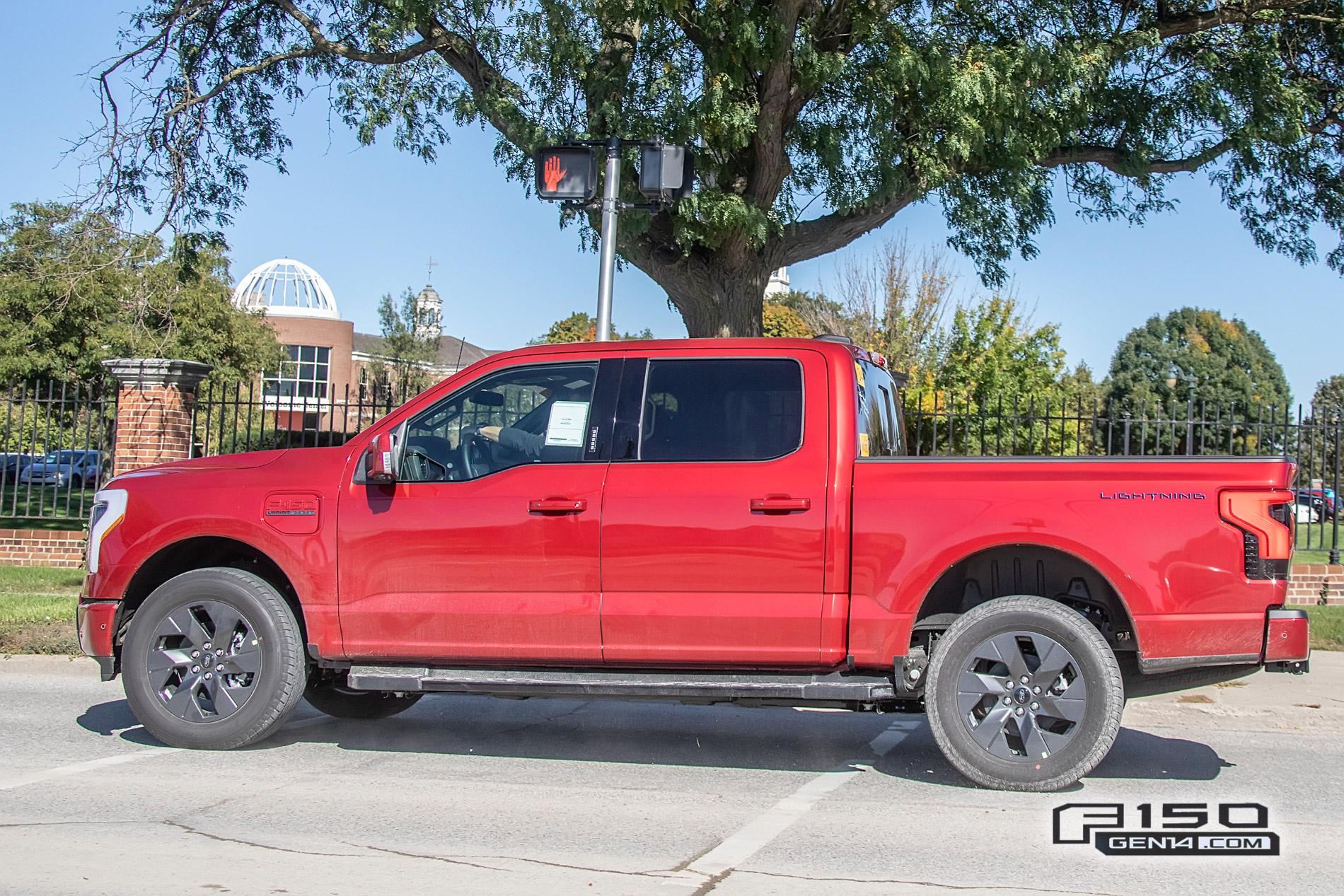 Ford F-150 Lightning F-150 Lightning Platinum (Iconic Silver) & Lariat (Rapid Red) Spotted On Public Roads Production Rapid Red 2022 F150 Lightning Lariat EV Pickup Truck 8