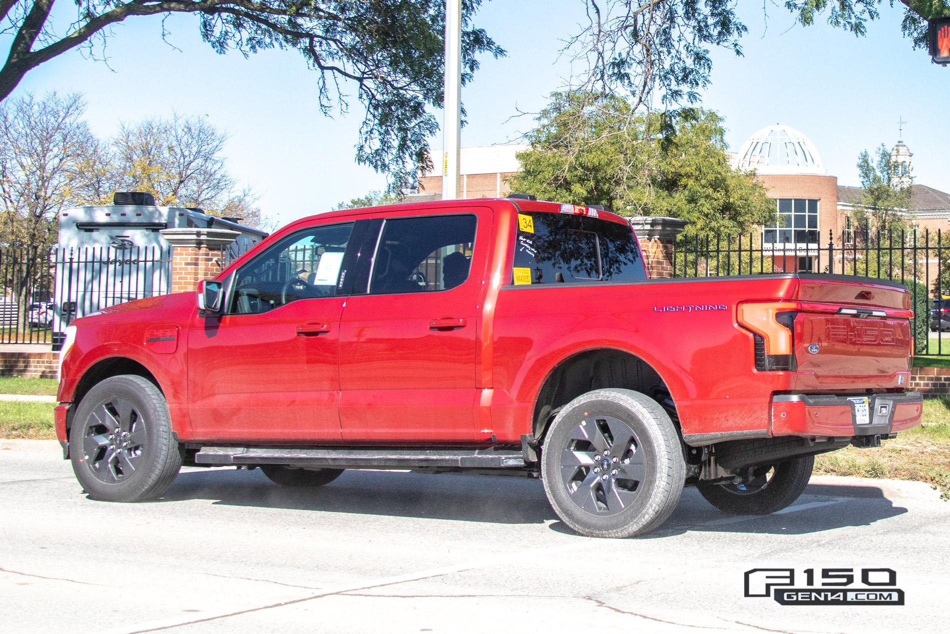 Ford F-150 Lightning F-150 Lightning Platinum (Iconic Silver) & Lariat (Rapid Red) Spotted On Public Roads Production Rapid Red 2022 F150 Lightning Lariat EV Pickup Truck 9