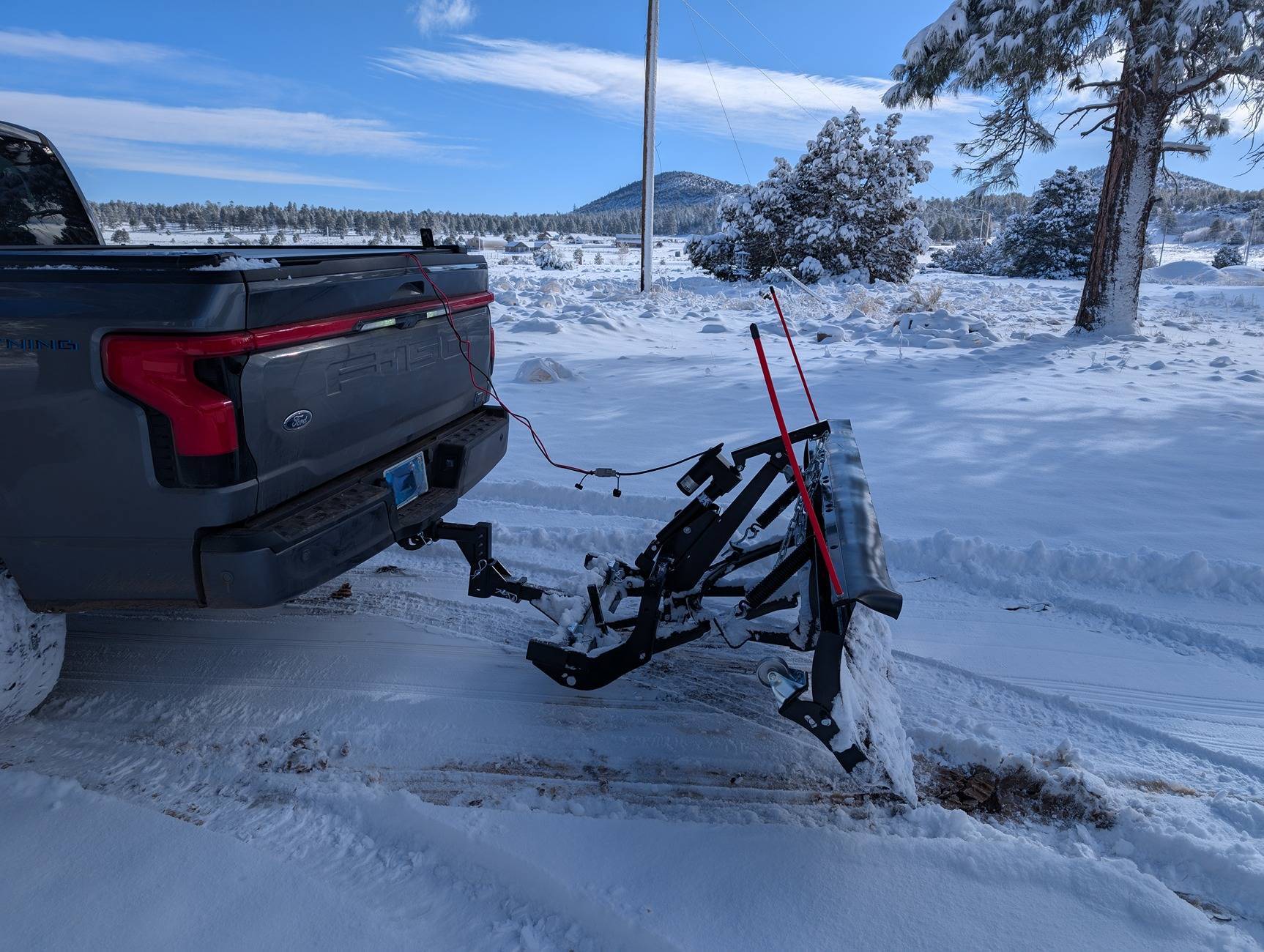 Ford F-150 Lightning First big snow of the winter...Snow plow on the rear hitch worked great. pxl_20250314_154601781-raw-01-cover-2-