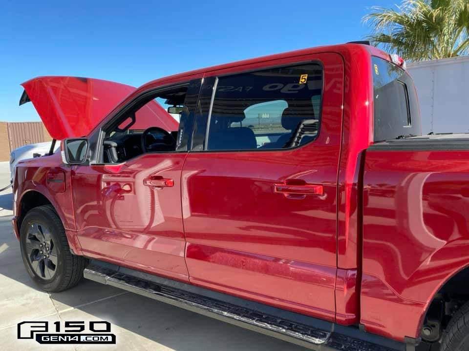 Ford F-150 Lightning Six 2022 F-150 Lightnings spotted charging during testing, w/ first Oxford White look Rapid Red F150 Lightnin