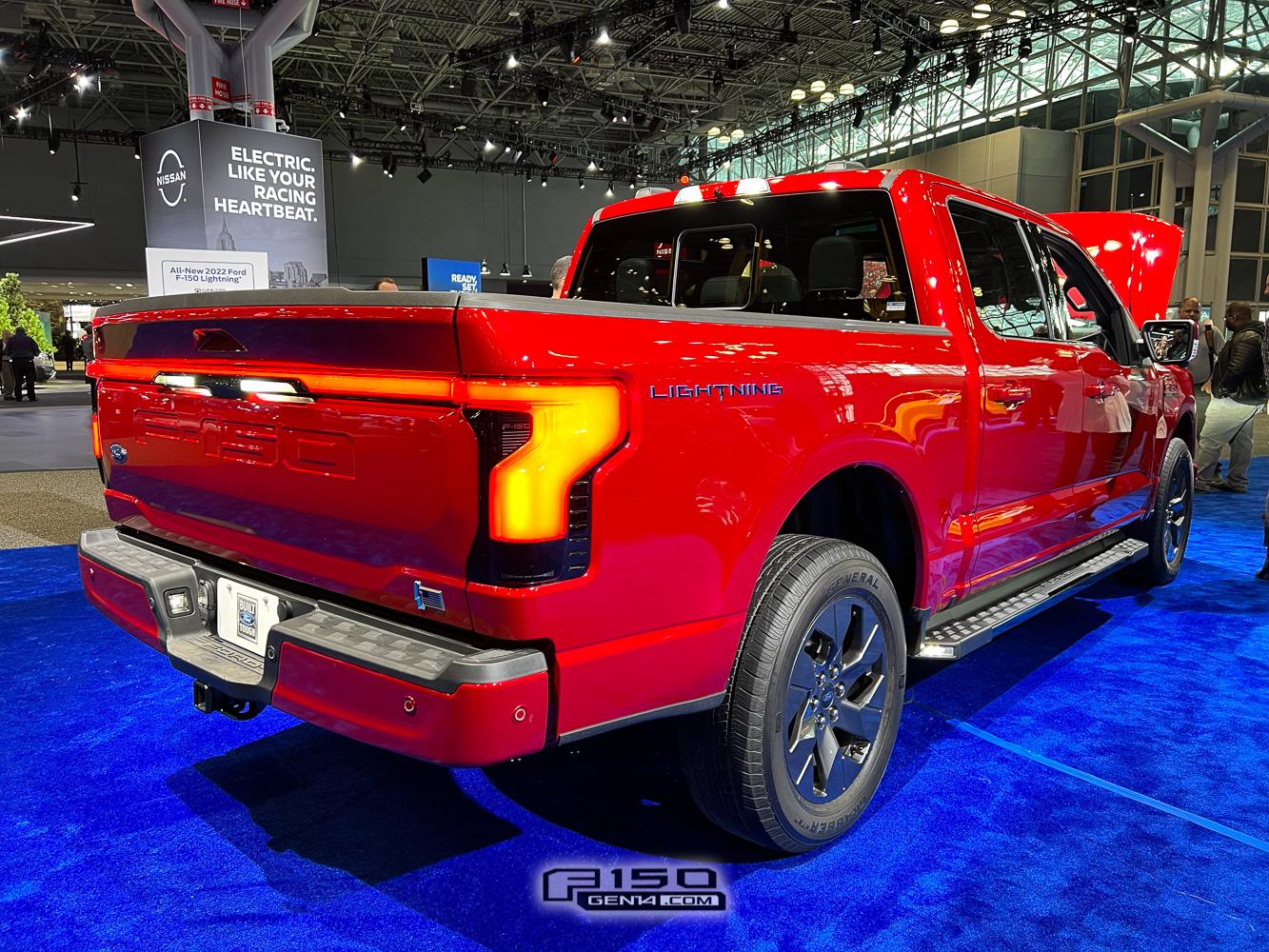 Ford F-150 Lightning RAPID RED F-150 Lightning Photos & Club rapid-red-f150-lightning-nyias-2022-7