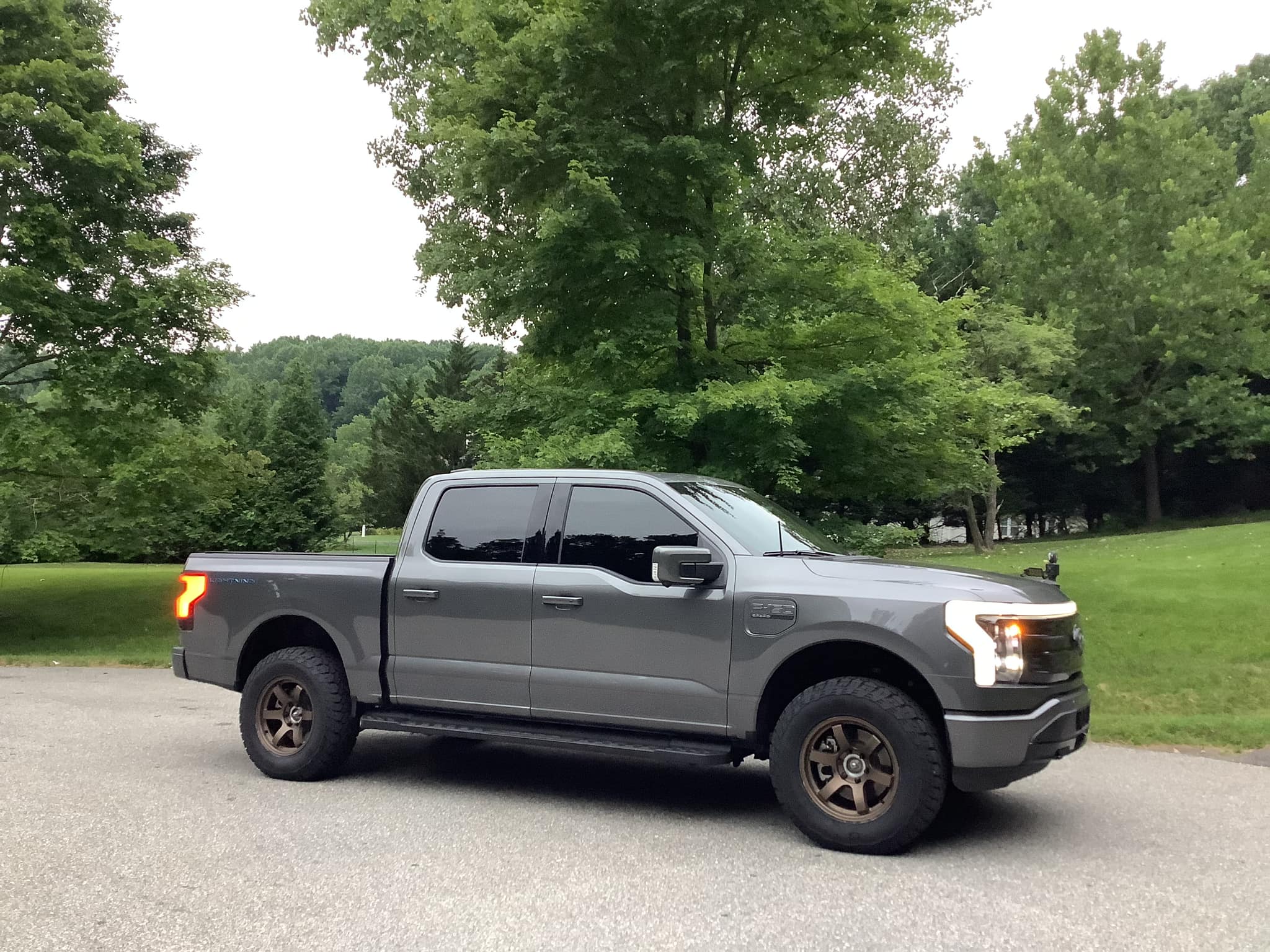 Ford F-150 Lightning Lightning Platinum on 18" Rays Wheels + 275/70 General Grabber ATX + Readylift 2" front leveling kit Readylift 2%22 front leveling kit F150 Lightning Platinum on 18%22 Rays Wheels + 275:70 Genera