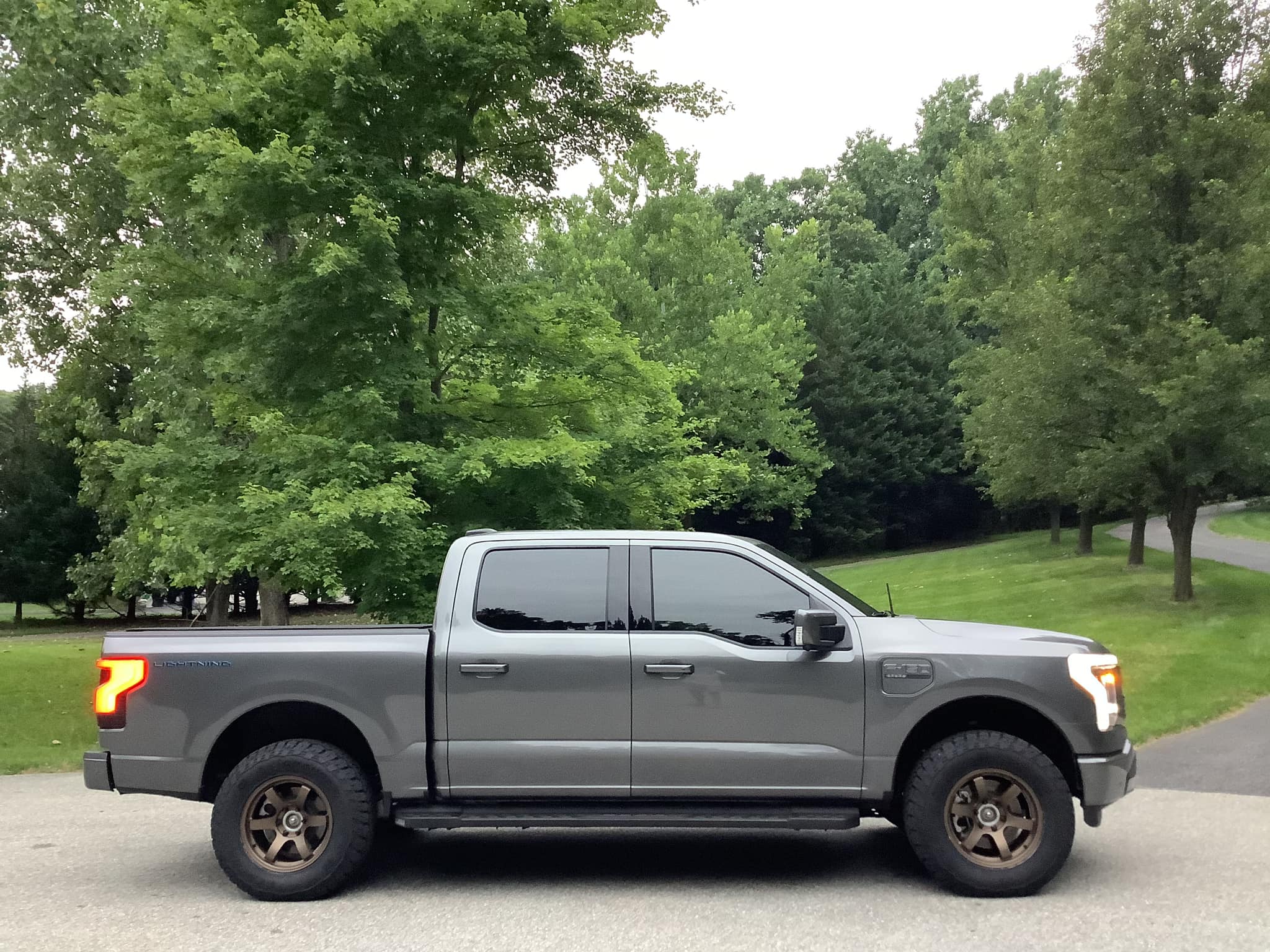 Ford F-150 Lightning CARBONIZED GRAY F-150 Lightning Photos & Club Readylift 2%22 front leveling kit F150 Lightning Platinum on 18%22 Rays Wheels + 275:70 Genera