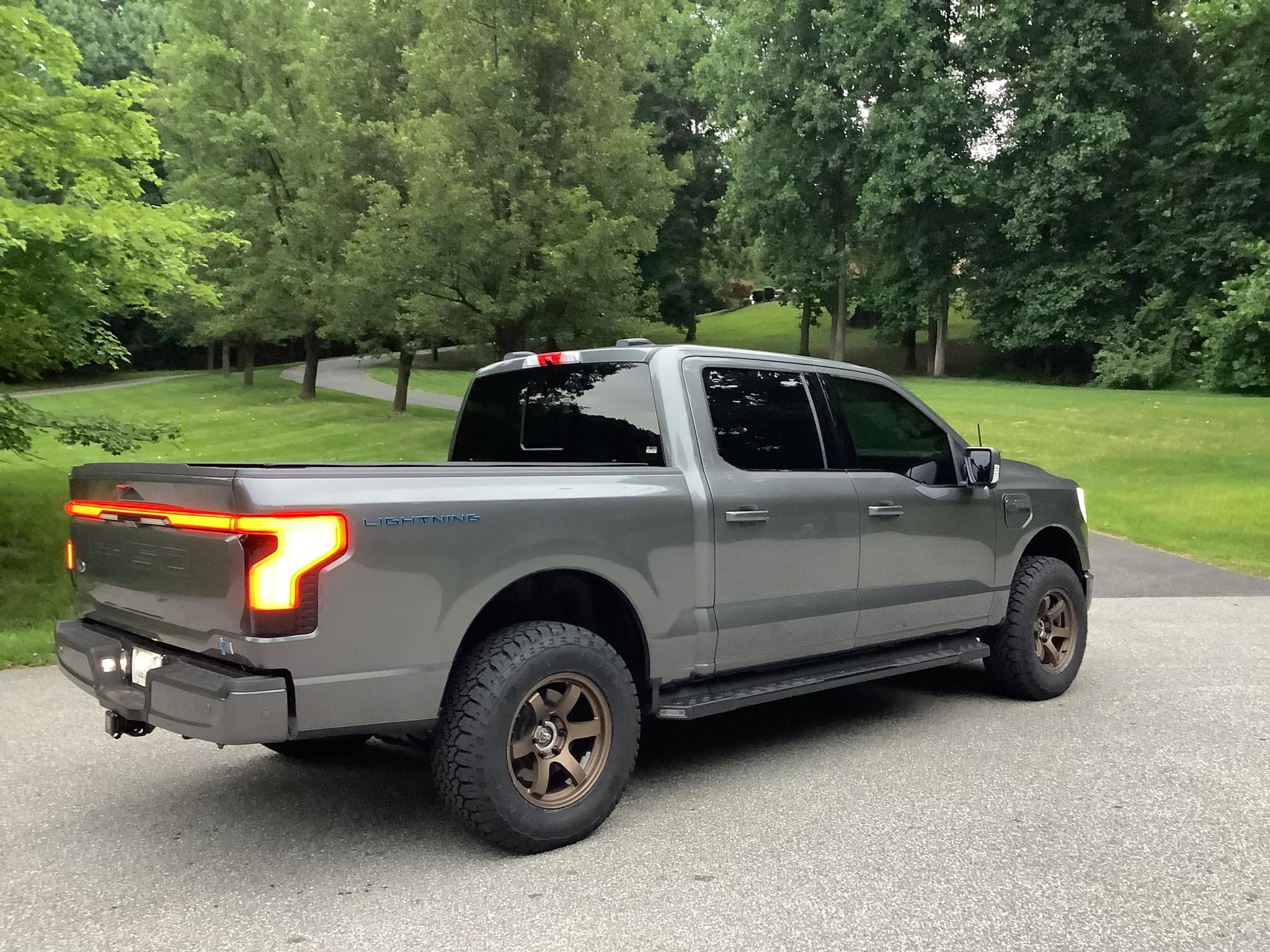 Ford F-150 Lightning CARBONIZED GRAY F-150 Lightning Photos & Club Readylift 2%22 front leveling kit F150 Lightning Platinum on 18%22 Rays Wheels + 275:70 Genera