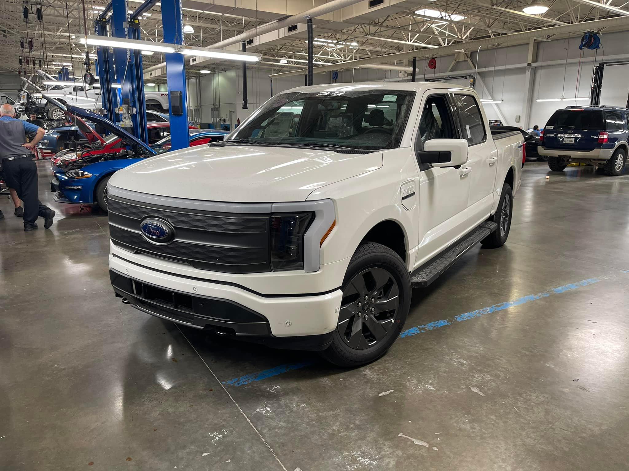 Ford F-150 Lightning STAR WHITE F-150 Lightning Photos & Club Star White Lightning EV Picku