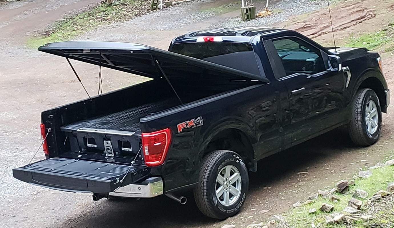 Ford F-150 Lightning Installed Undercover Elite hard tonneau cover. Tonnaeu