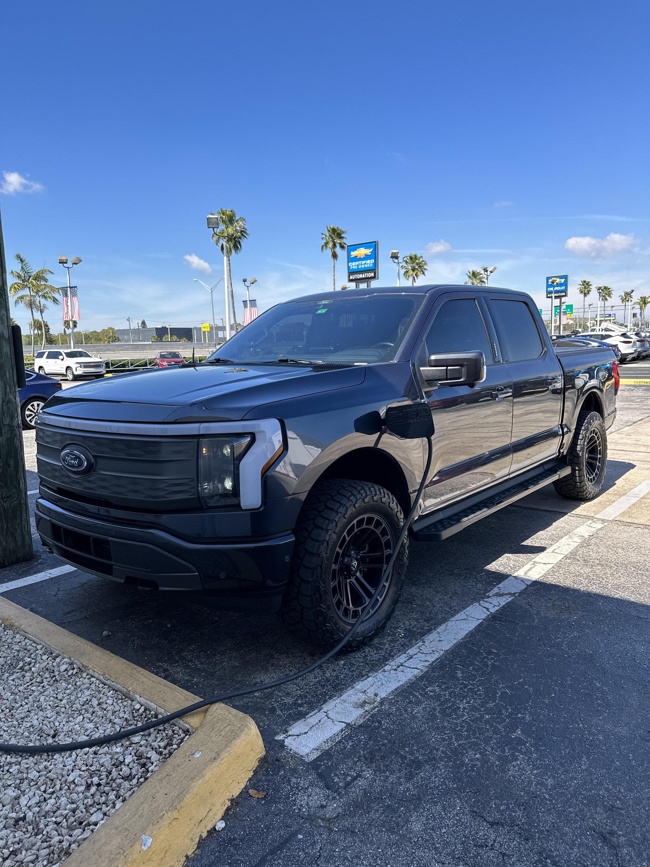 Ford F-150 Lightning 2023 Star White Lightning Lariat Build -- Leveled, Nittos, Vorrsteiner VR601s, Tint truck2