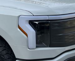 Ford F-150 Lightning Avalanche Lightning Arrived.  It honestly just looks white. White Contrast other lightning.JPG