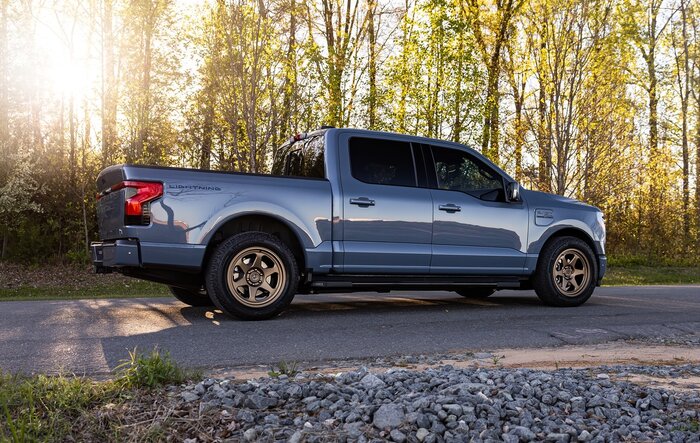 Beauty shots of my Lightning. New, fully forged Trex T-200 bronze wheels, ICON stage IV lowering kit, gloss black vinyl wrapped grill, other goodies.